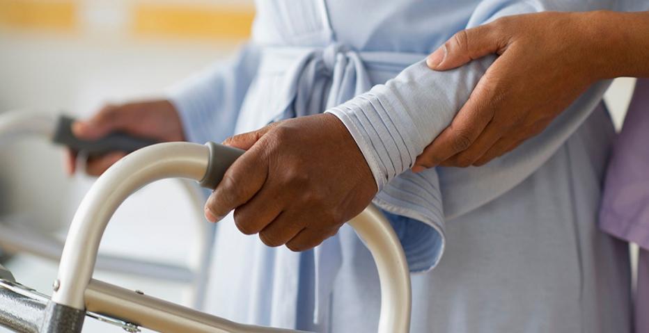 Caregiver Helping Older Adult