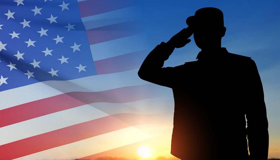 Veteran saluting flag