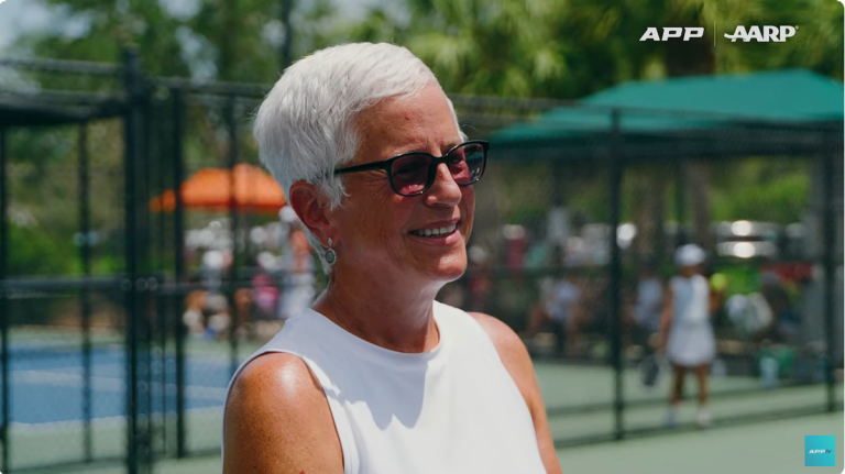 a woman on a pickleball court