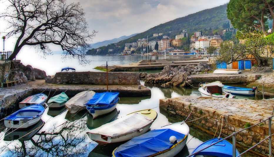 boats moored at a pier in opatija in croatia