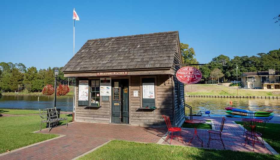 a boat house next to the cane river in natchitoches, louisiana