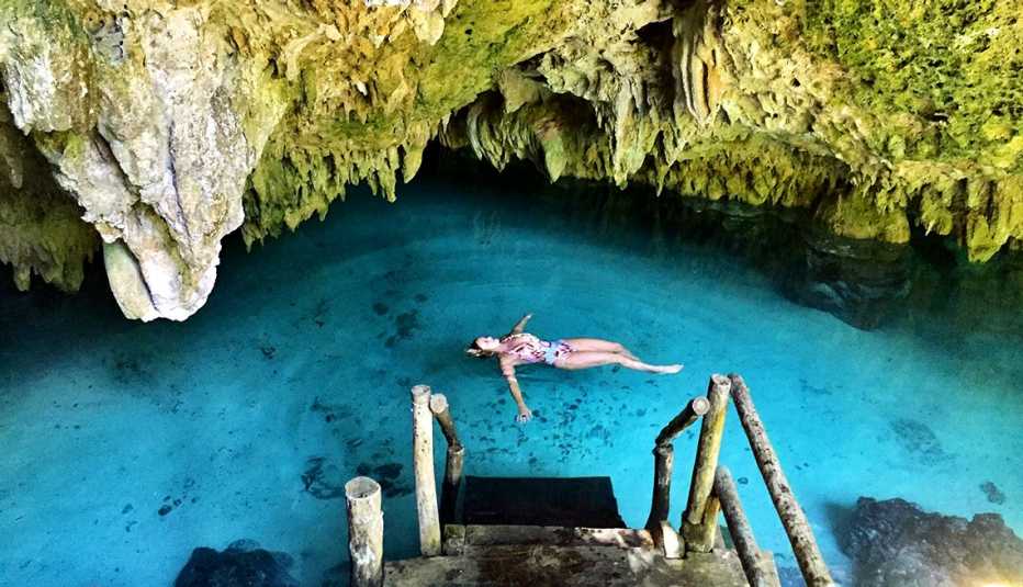 woman swimming in lagoon in Mexico