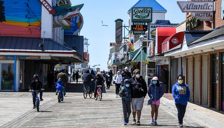 People get out on a cold blustery day to walk the Ocean City, MD boardwalk 