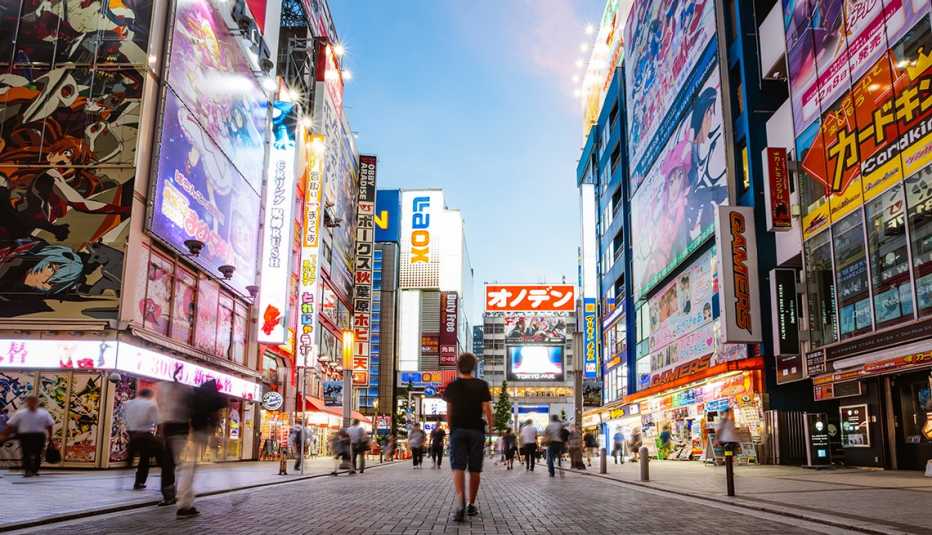 Young man at Akihabara electric town, street view, Tokyo, Japan