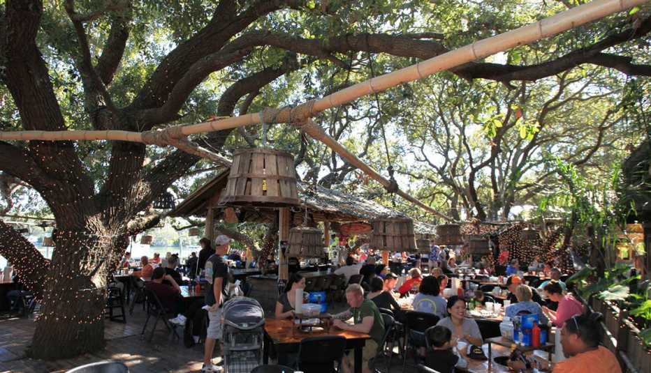 people sitting at tables outside at The Crab Shack on Tybee Island, Georgia