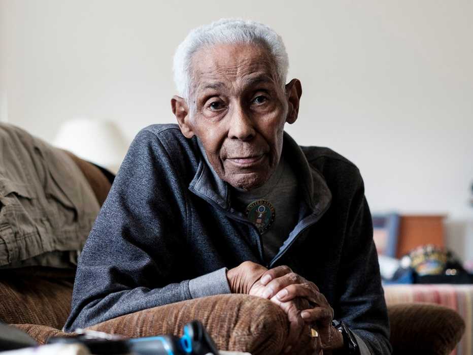 james a diamond leans forward in a recliner chair