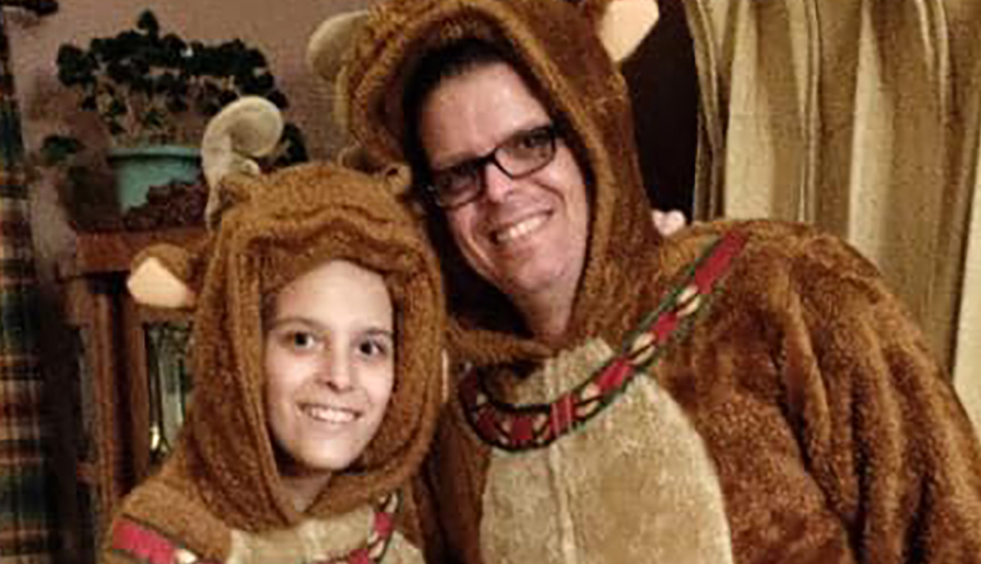 a man and son dressed in costumes