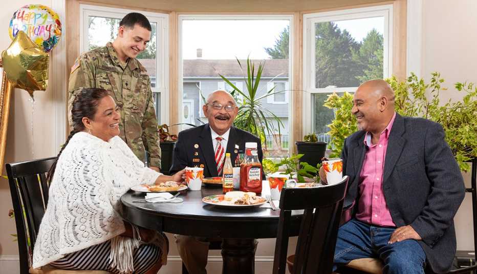 The Gomez family around a table