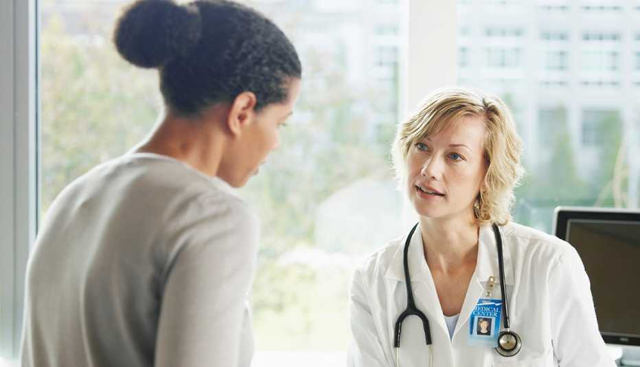 Woman talking to a doctor