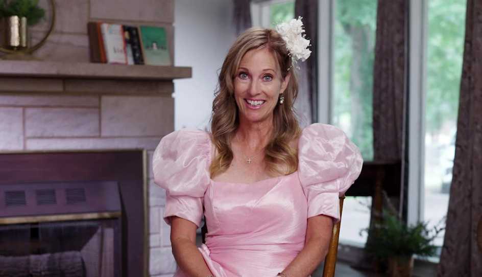 a woman in an old prom dress