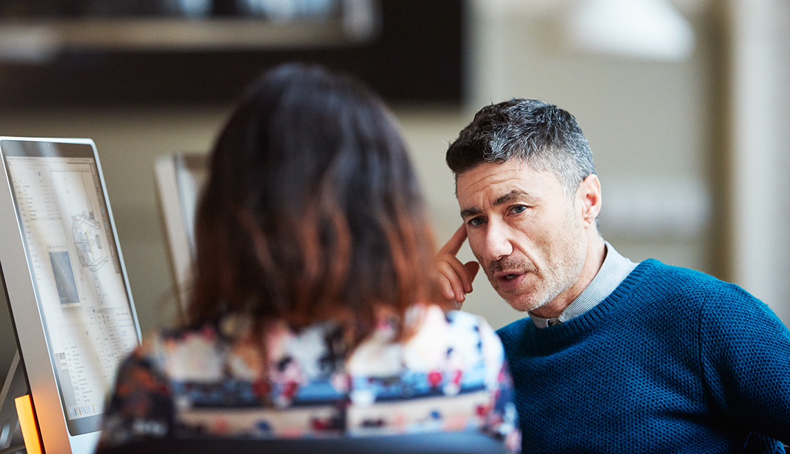 Two business colleagues having a conversation