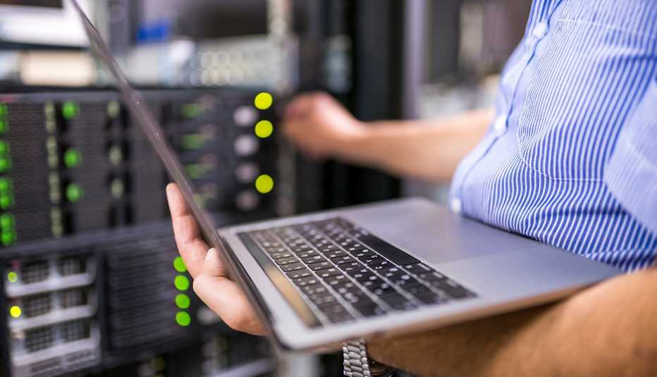 An engineer works on a computer server