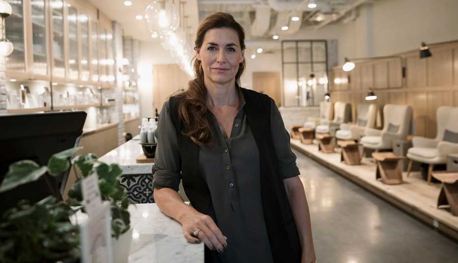 woman standing at counter of business
