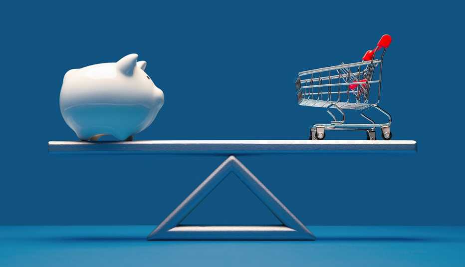 Balanza que en el extremo derecho tiene una alcancía en forma de cerdito y al otro un carro de compras