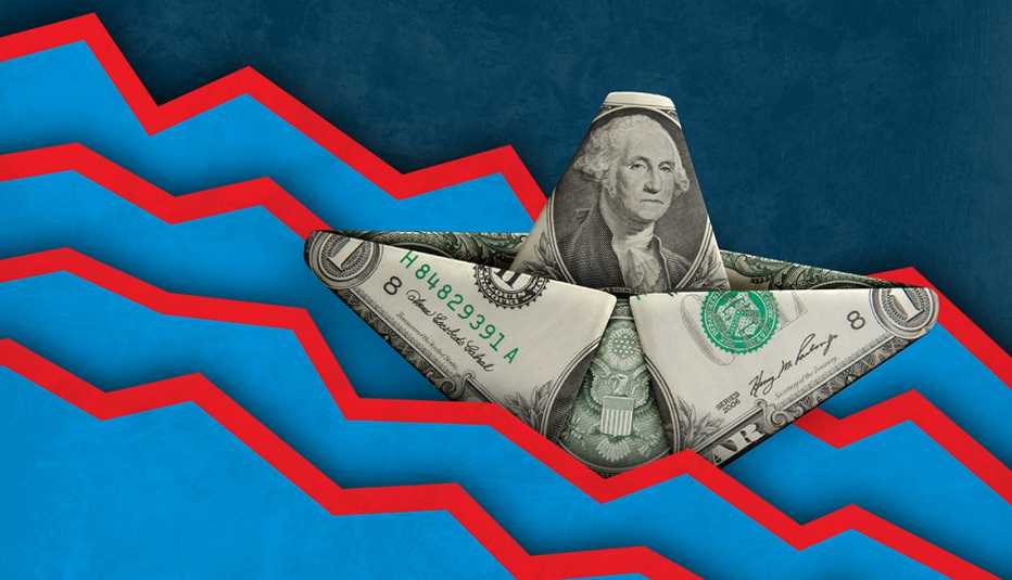 Composición digital de un barco de papel con un billete de un dólar hundiéndose entre líneas de gráficos que caen.