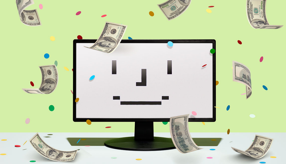 monitor de computadora con fondo verde con dinero flotando a su alrededor