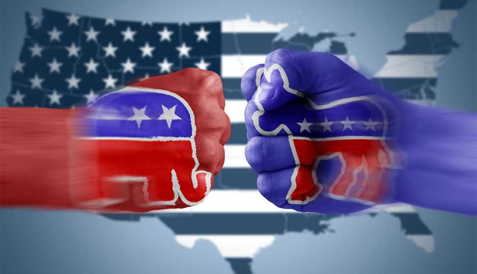 Puños de color rojo y azul sobre la bandera de Estados Unidos