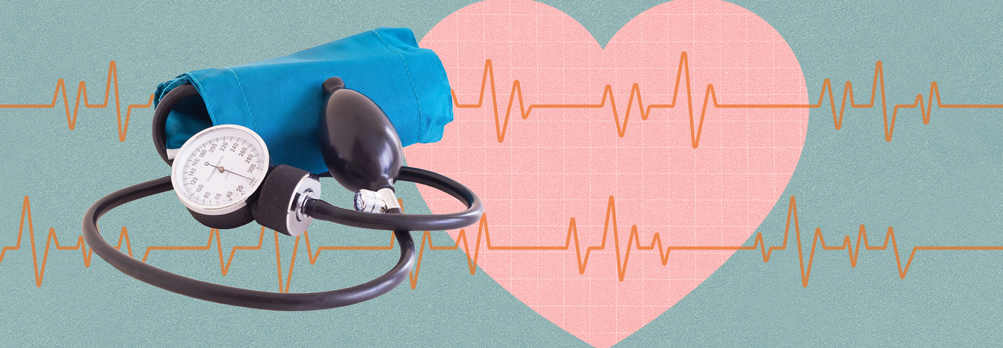 blood pressure cuff with a heart and a heart rate monitor line in the background