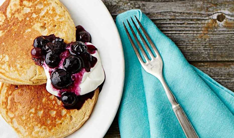 A close-up view of oatmeal-almond protein pancakes on a plate