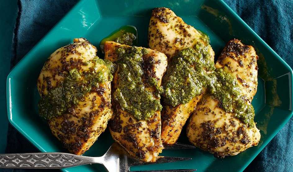 A close-up view of chimichurri chickens on a plate