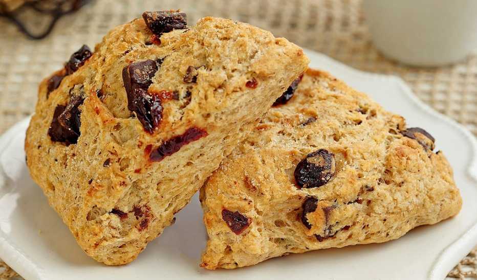A close-up view of chocolate-cherry scones on a plate