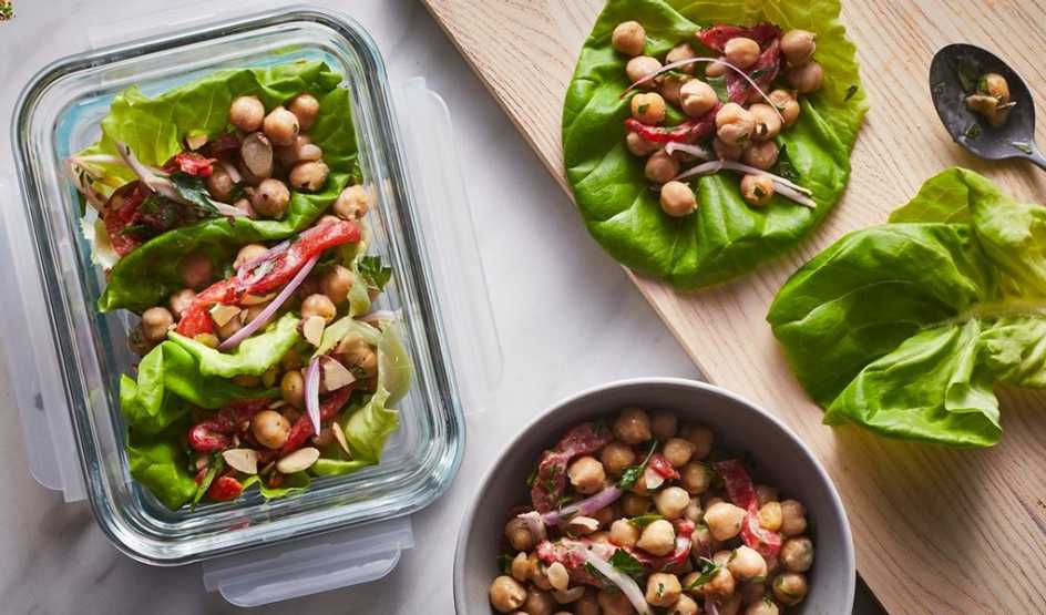 A close-up view of chickpea and roasted red pepper lettuce wraps