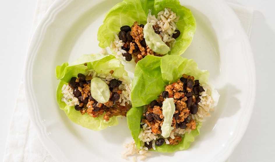 A close-up view of turkey taco lettuce wrap on a plate