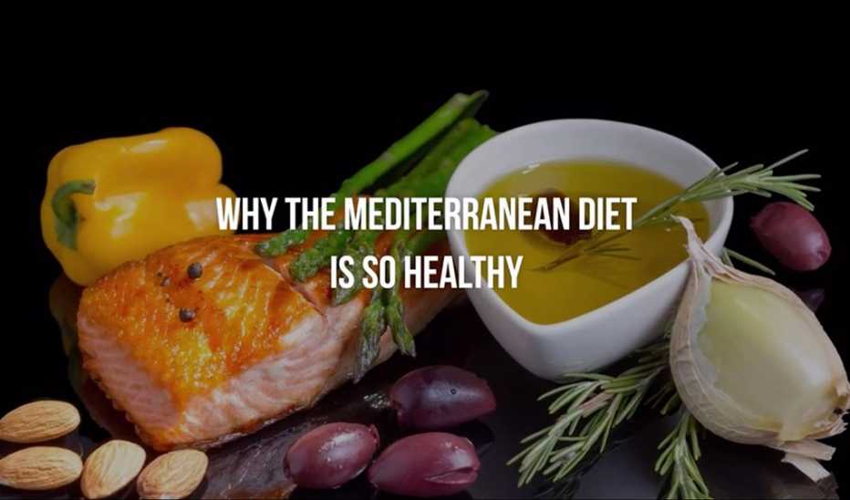A close-up view of Mediterranean diet foods with the text "why the Mediterranean diet is so healthy"