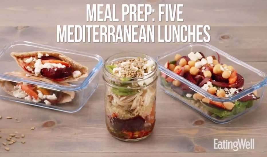 A close-up view of containers filled with Mediterranean meal prep lunches with the text "meal prep: five Mediterranean lunches"